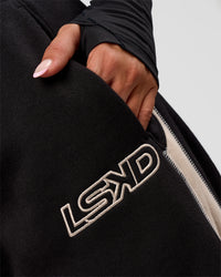 Woman wearing Power Play Stitch Up Fleece Sweat Pant - Black-Shale Beige | Model:Bianca | Size:S | Thumbnail Index: 5