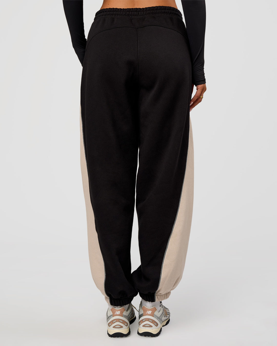 Woman wearing Power Play Stitch Up Fleece Sweat Pant - Black-Shale Beige | Model:Bianca | Size:S - view 5