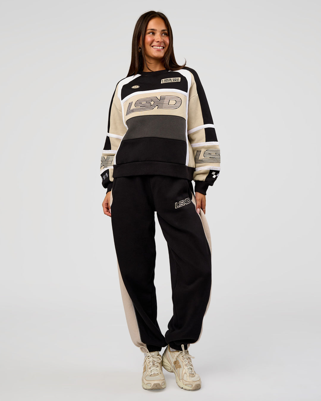 Woman wearing Power Play Stitch Up Fleece Sweat Pant - Black-Shale Beige | Model:Bianca | Size:S - view 3