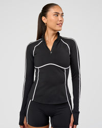 Woman wearing Power Quarter Zip Jacket - Black | Model:Rhiley | Size:S | Thumbnail Index: 6