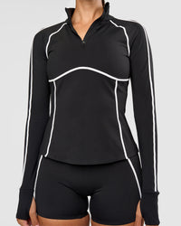 Woman wearing Power Quarter Zip Jacket - Black | Model:Rhiley | Size:S | Thumbnail Index: 7