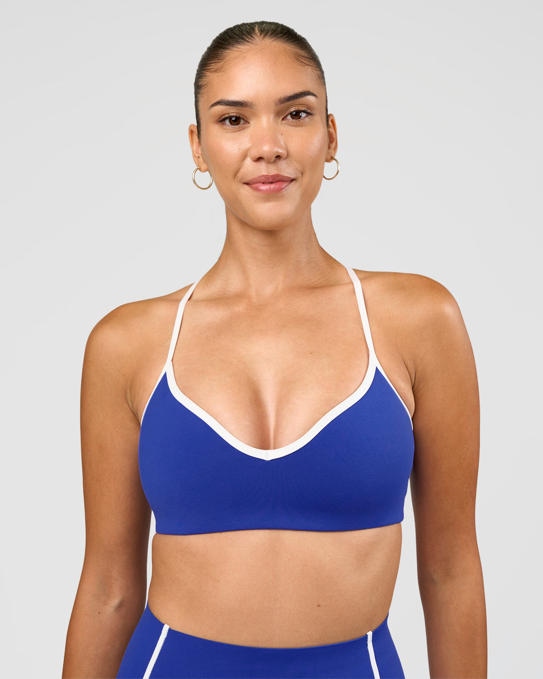 Woman wearing Power Sweetheart Sports Bra - Electric Indigo | Model:Rhiley | Size:S - view 5
