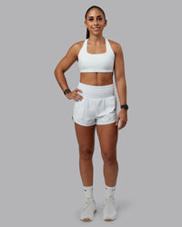 Woman wearing Power Train 2" Short - White | Model:Tylah | Size:S | Thumbnail Index: 1