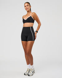 Woman wearing Power Ultra High-Rise 4" Short Pockets - Black | Model:Rhiley | Size:S | Thumbnail Index: 4