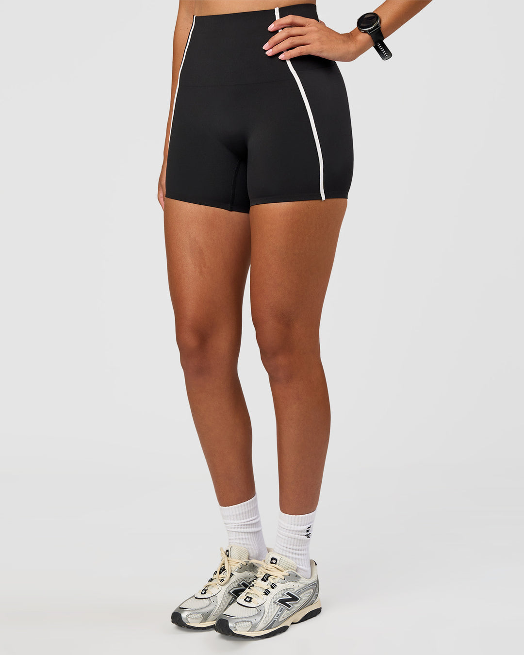 Woman wearing Power Ultra High-Rise 4" Short Pockets - Black | Model:Rhiley | Size:S - view 6