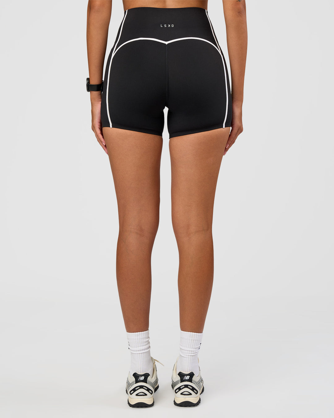 Woman wearing Power Ultra High-Rise 4" Short Pockets - Black | Model:Rhiley | Size:S - view 9