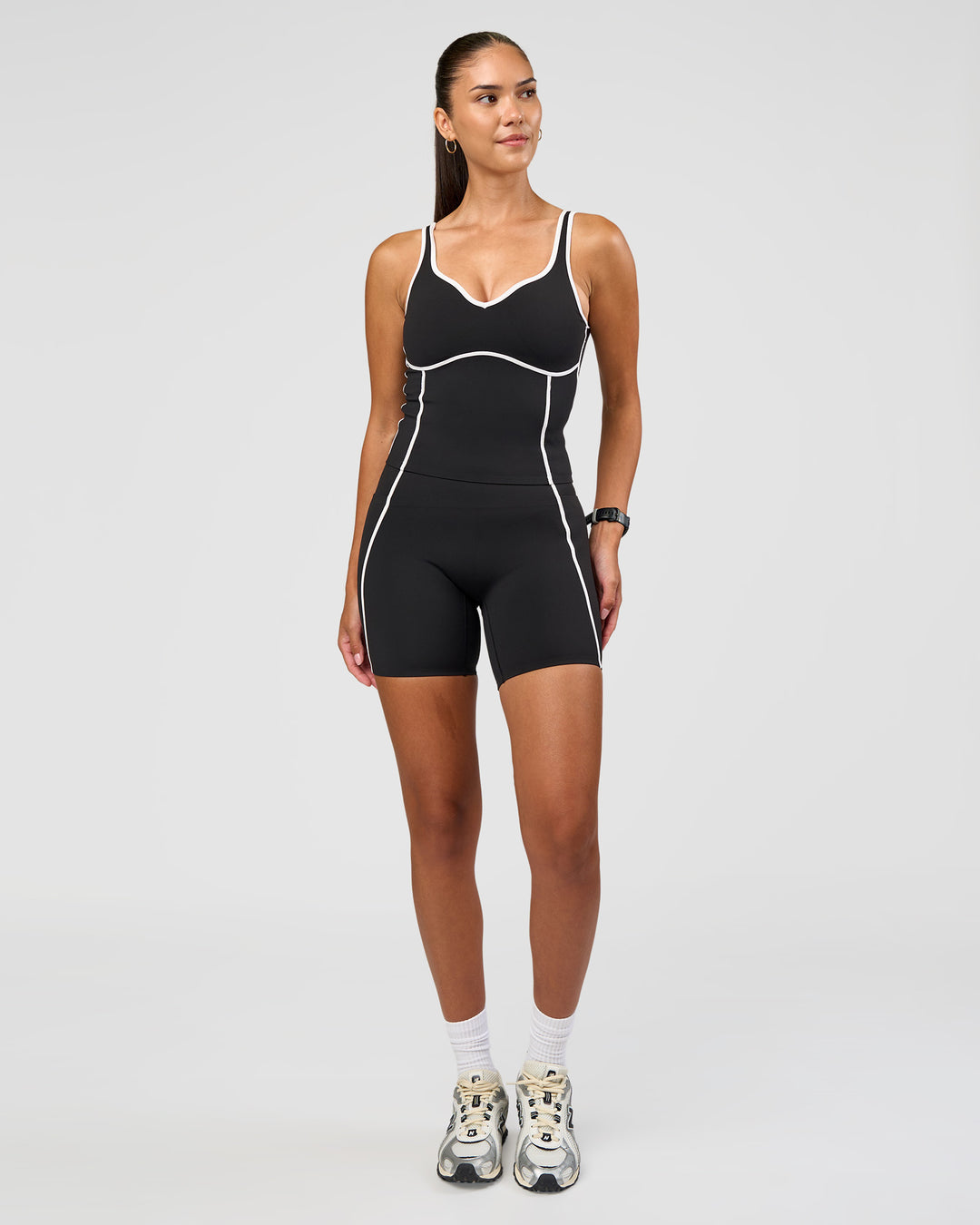 Woman wearing Power Ultra High-Rise 6" Short Pockets - Black | Model:Rhiley | Size:S - view 3