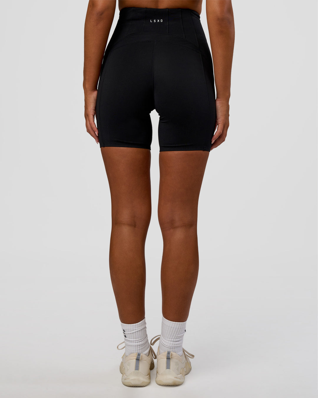 Woman wearing Progression Ultra High-Rise 6" Short - Black | Model:Kirstyn | Size:S - view 4