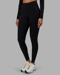 Woman wearing Progression Ultra High-Rise Full Length Legging - Black | Model:Rhiley | Size:S | Thumbnail Index: 11