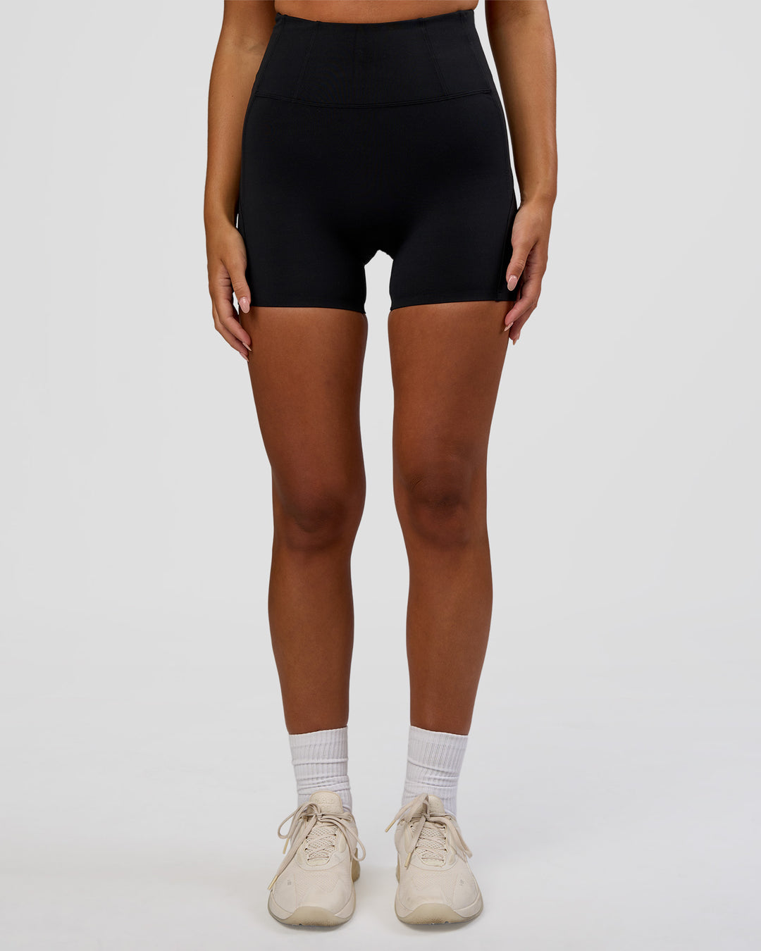 Woman wearing Progression Ultra High-Rise 4" Short - Black | Model:Kirstyn | Size:S - view 6
