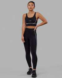 Woman wearing Pulse Sports Bra - Black | Thumbnail Index: 5