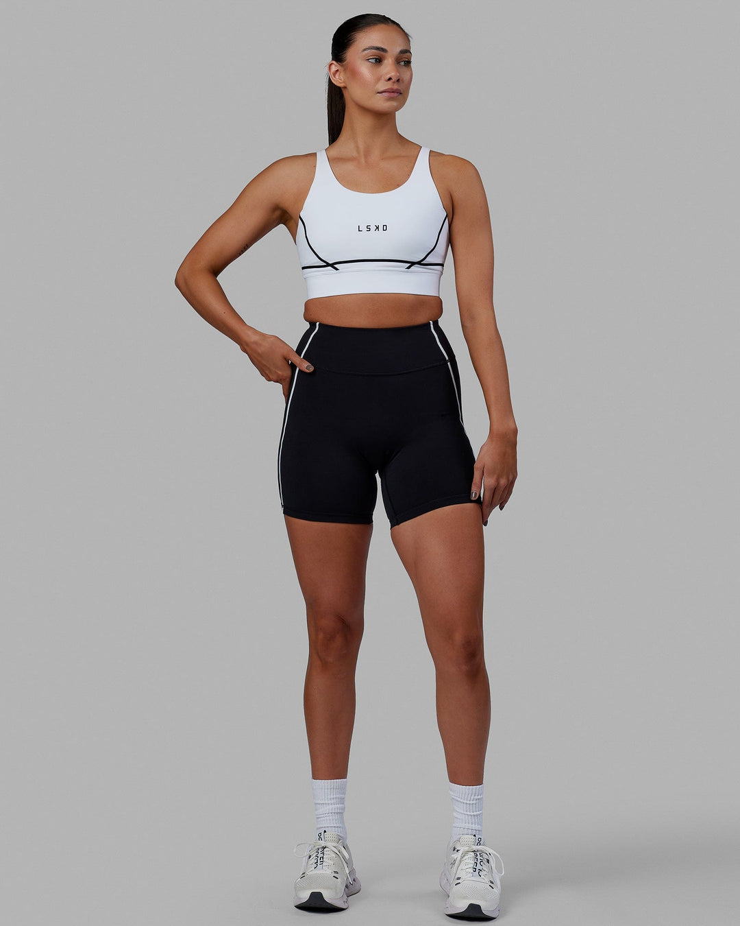 Woman wearing Pulse Sports Bra - White - view 7