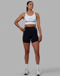 Woman wearing Pulse Sports Bra - White | Thumbnail Index: 6