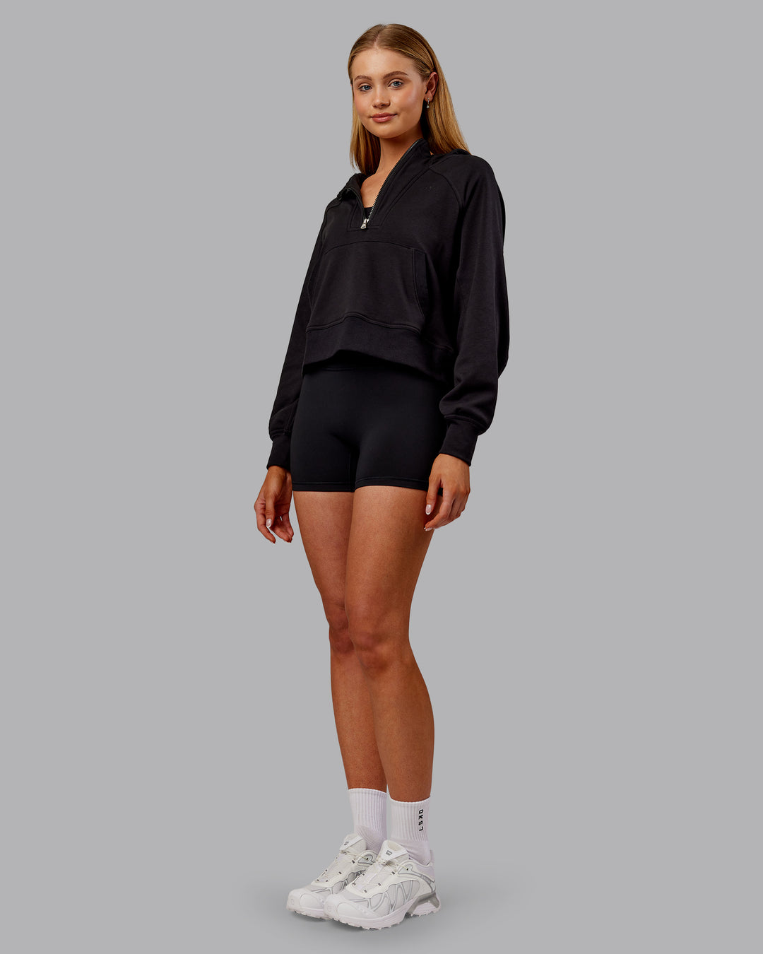 Woman wearing Pursue Mid-Weight Hoodie - Black | Model:Ella | Size:S - view 2