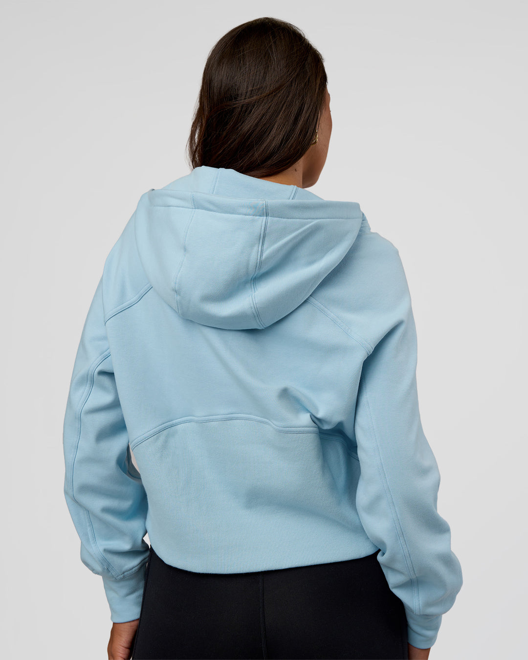 Woman wearing Pursue Mid-Weight Hoodie - Glacial Blue | Model:Kirstyn | Size:S - view 5