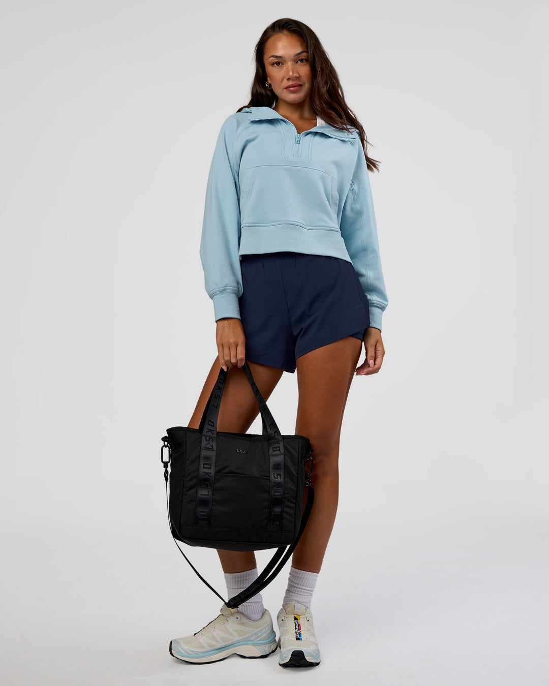 Woman wearing Pursue Mid-Weight Hoodie - Glacial Blue | Model:Kirstyn | Size:S - view 2