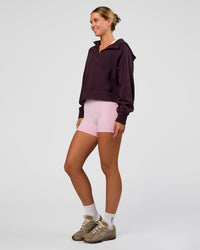 Woman wearing Pursue Mid-Weight Hoodie - Midnight Plum | Model:Amity | Size:S | Thumbnail Index: 5