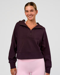 Woman wearing Pursue Mid-Weight Hoodie - Midnight Plum | Model:Amity | Size:S | Thumbnail Index: 3