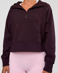 Woman wearing Pursue Mid-Weight Hoodie - Midnight Plum | Model:Amity | Size:S | Thumbnail Index: 4