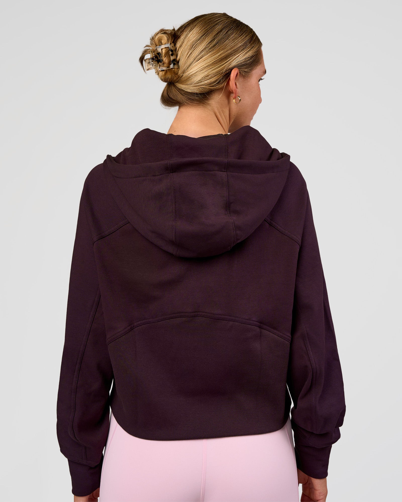 Woman wearing Pursue Mid-Weight Hoodie - Midnight Plum | Model:Amity | Size:S