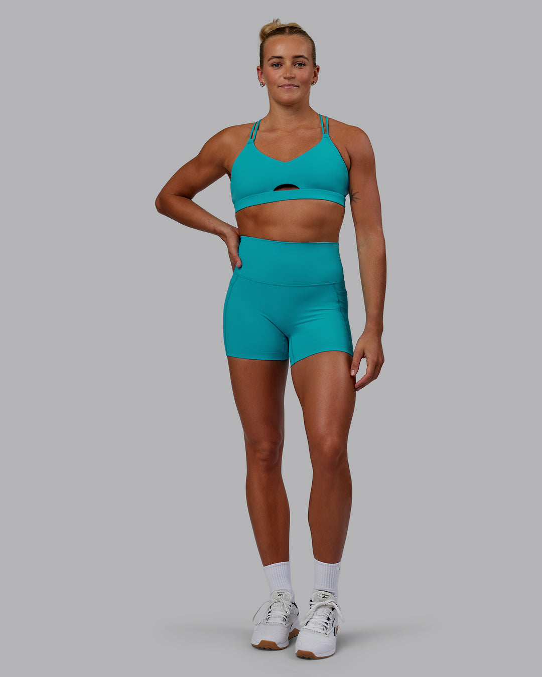 Woman wearing Pursue Sports Bra - Blue Bird - view 5