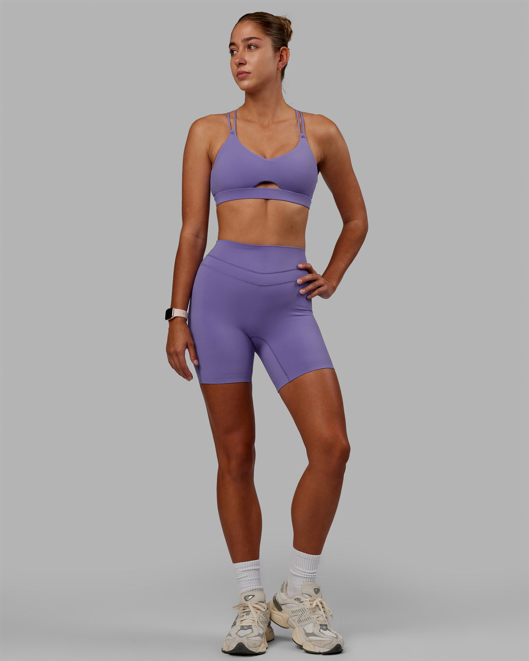 Woman wearing Pursue Sports Bra - Dahlia Purple - view 7