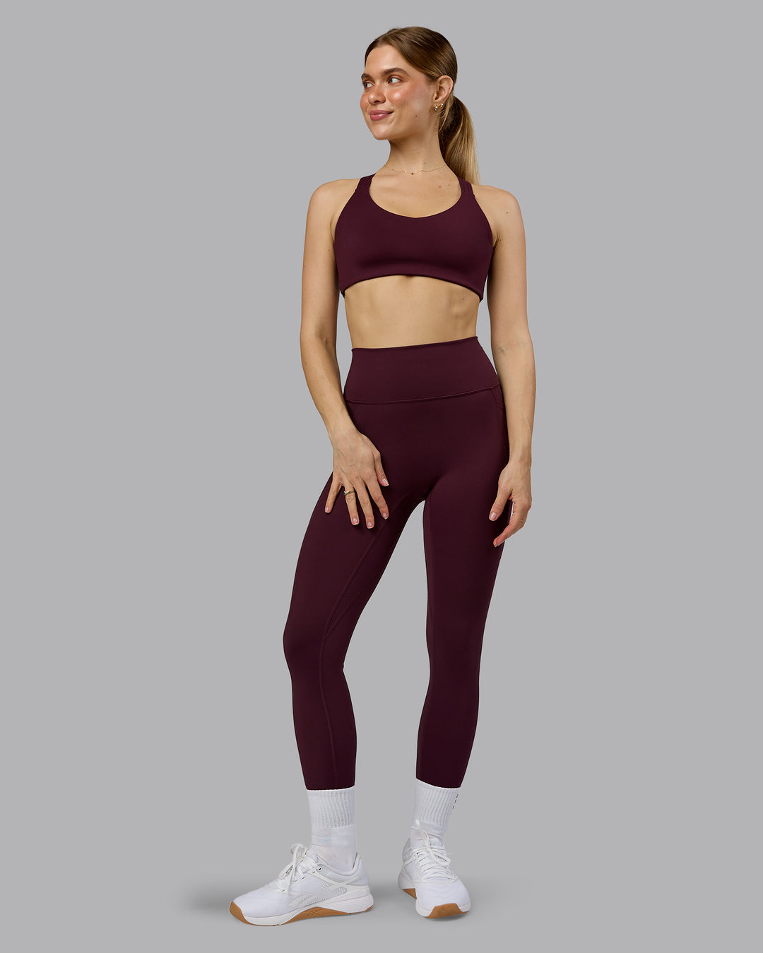 Woman wearing Push The Limit Sports Bra - Cherry Lacquer  Model:Emilie | Size:S - view 7