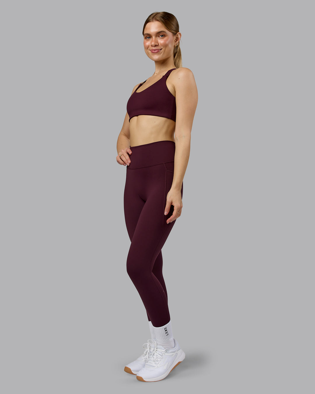 Woman wearing Push The Limit Sports Bra - Cherry Lacquer  Model:Emilie | Size:S - view 6