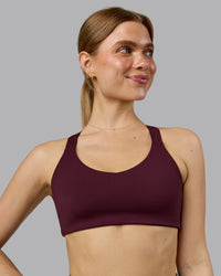 Woman wearing Push The Limit Sports Bra - Cherry Lacquer  Model:Emilie | Size:S | Thumbnail Index: 0