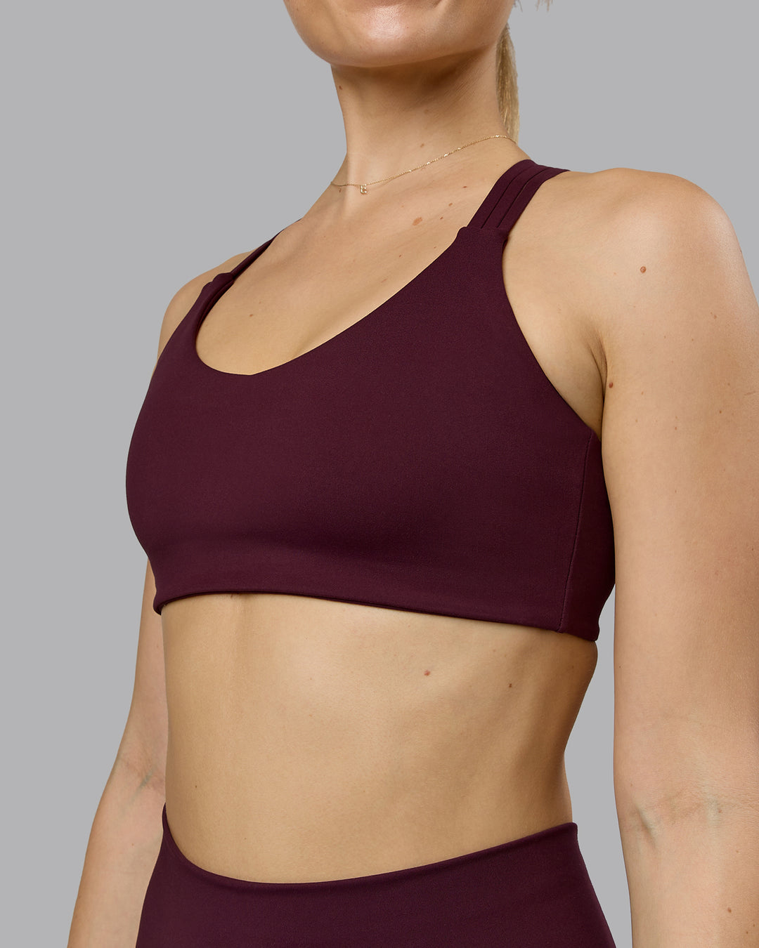 Woman wearing Push The Limit Sports Bra - Cherry Lacquer  Model:Emilie | Size:S - view 5