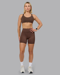 Woman wearing Push The Limit Sports Bra in Chocolate Martini | Model:Halle | Size:S | Thumbnail Index: 0