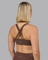 Woman wearing Push The Limit Sports Bra in Chocolate Martini | Model:Halle | Size:S | Thumbnail Index: 1