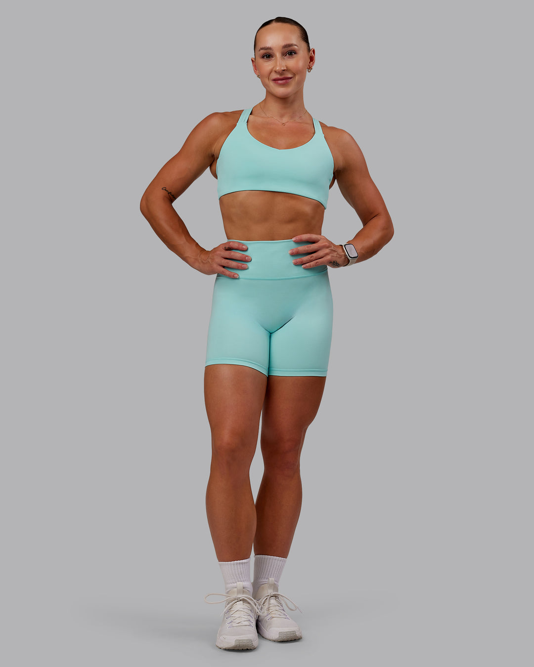 Woman wearing Push The Limit Sports Bra in Island Paradise | Size:S - view 7