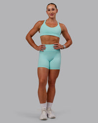 Woman wearing Push The Limit Sports Bra in Island Paradise | Size:S | Thumbnail Index: 6