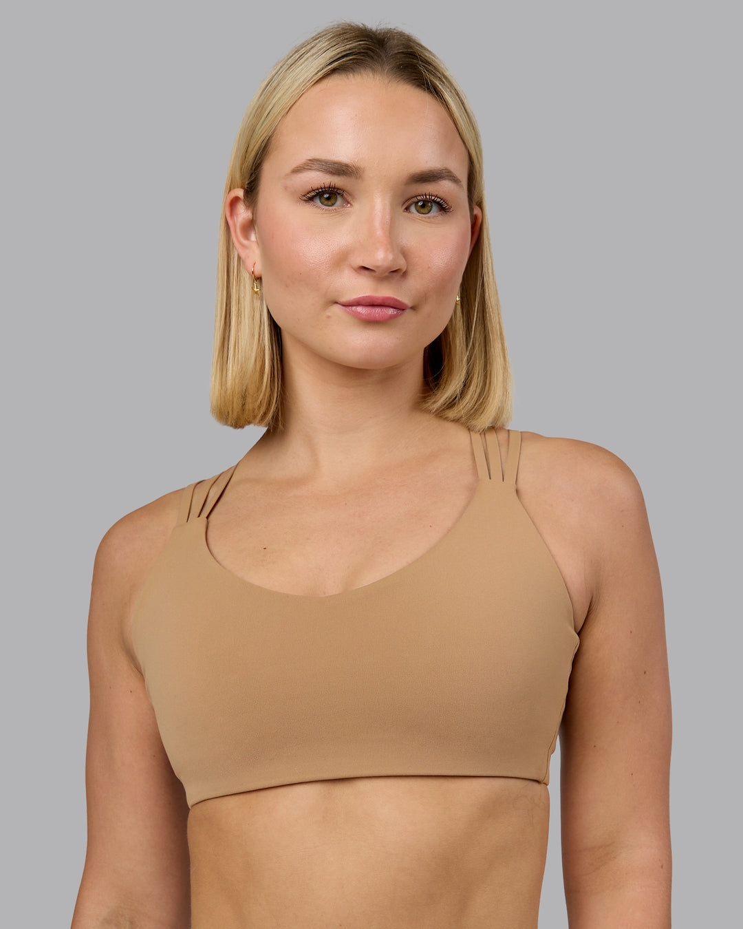 Woman wearing Push The Limit Sports Bra - Light Taupe | Model:Halle | Size:S - view 1