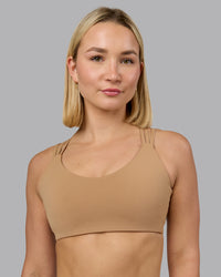 Woman wearing Push The Limit Sports Bra - Light Taupe | Model:Halle | Size:S | Thumbnail Index: 0
