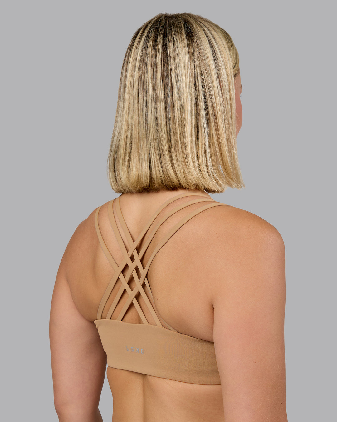 Woman wearing Push The Limit Sports Bra - Light Taupe | Model:Halle | Size:S - view 2