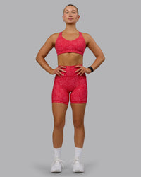 Woman wearing Push The Limit Sports Bra - Red Vitality Print | Thumbnail Index: 5
