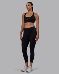 Woman wearing RXD Low-Rise 7/8 Legging - Black | Model:Blaize | Size:S | Thumbnail Index: 5