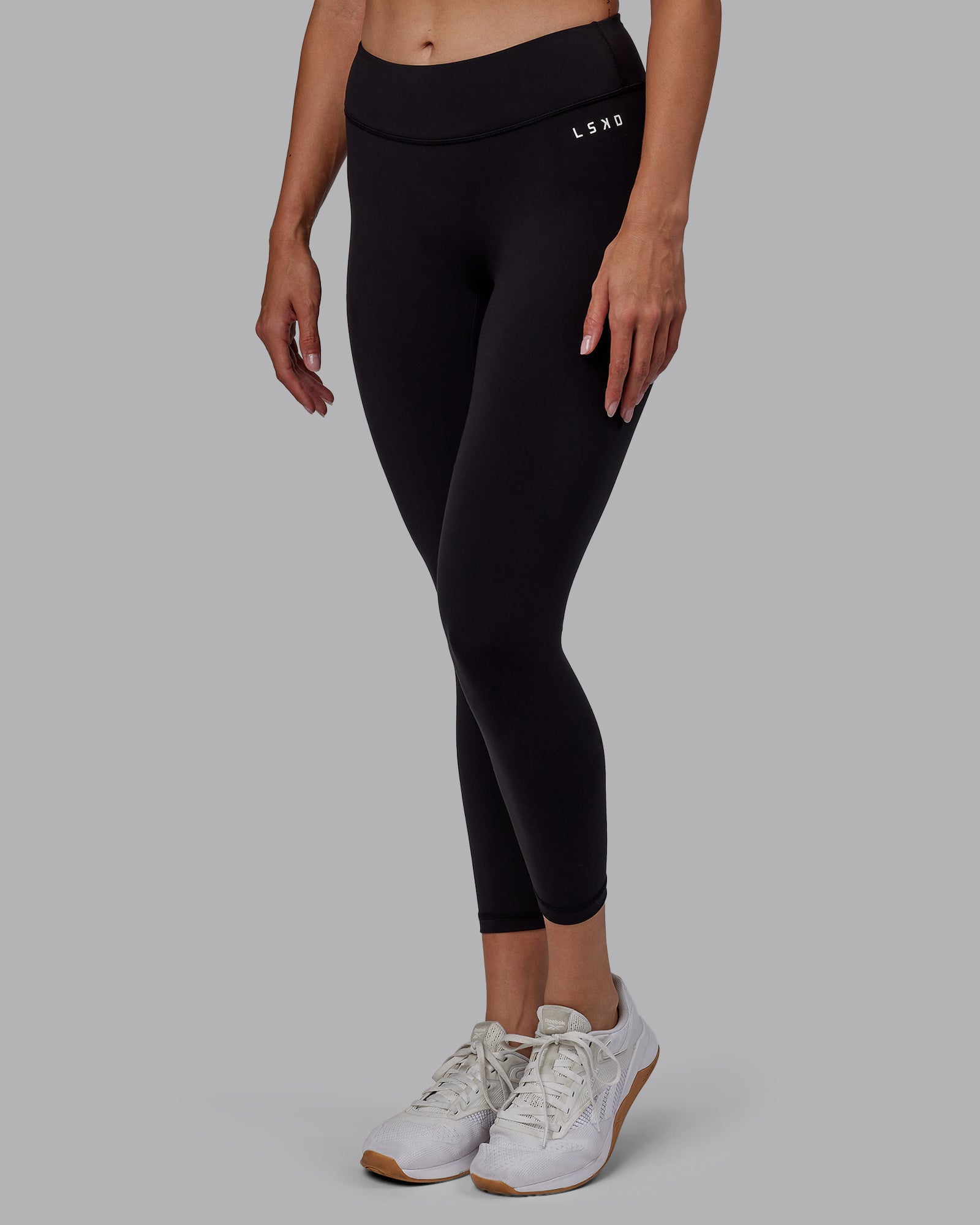 Woman wearing RXD Low-Rise 7/8 Legging - Black | Model:Blaize | Size:S