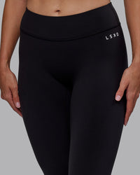 Woman wearing RXD Low-Rise 7/8 Legging - Black | Model:Blaize | Size:S | Thumbnail Index: 4