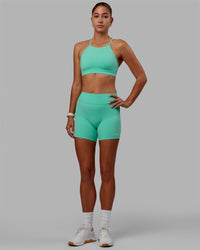 Woman wearing RXD Low-Rise 6" Short - Cockatoo | Thumbnail Index: 4
