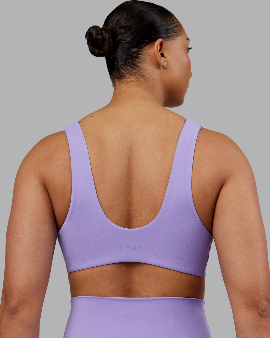 Woman wearing Reform Sports Bra - Violet Ray | Model:Ayla | Size:S - view 2