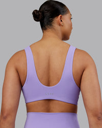 Woman wearing Reform Sports Bra - Violet Ray | Model:Ayla | Size:S | Thumbnail Index: 1