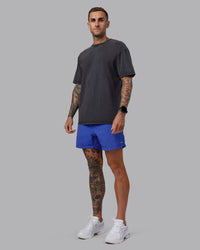 Man wearing Relentless Classic 5" Short - Power Cobalt | Model:Tommy | Size:S | Thumbnail Index: 2