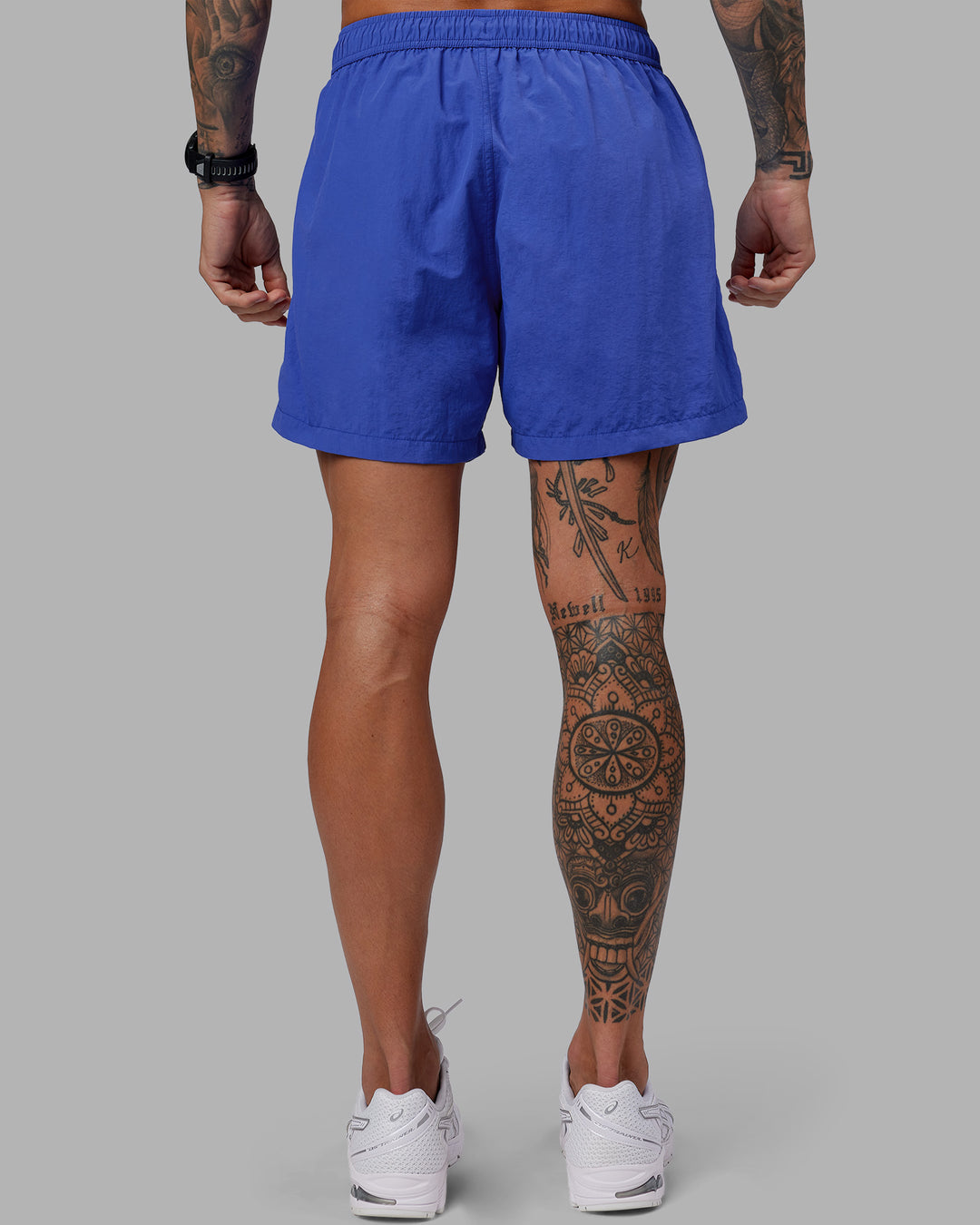 Man wearing Relentless Classic 5" Short - Power Cobalt | Model:Tommy | Size:S - view 4