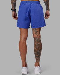 Man wearing Relentless Classic 5" Short - Power Cobalt | Model:Tommy | Size:S | Thumbnail Index: 3