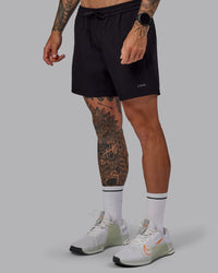 Man wearing Rep 5" Lined Performance Shorts in Black | Size:S | Thumbnail Index: 5
