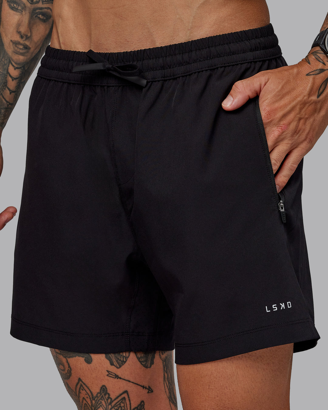 Man wearing Rep 5" Lined Performance Shorts in Black | Size:S - view 3