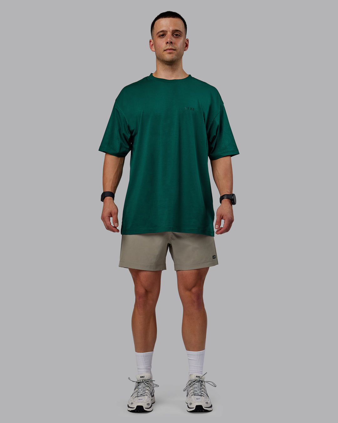 Man wearing Rep 5" Performance Shorts - Elephant - view 5
